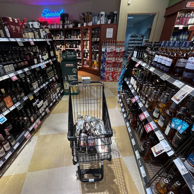 A shopping cart is shown at a government-run BC Liquor Store in Vancouver, on Friday, August 19, 2022. THE CANADIAN PRESS/Darryl Dyck