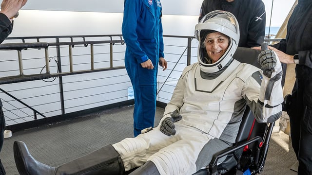NASA astronaut Sunita Williams shows her thumb as she safely returned to Earth with her colleagues after an unexpected 286-day mission aboard the International Space Station (ISS), in Florida on Wednesday. 
