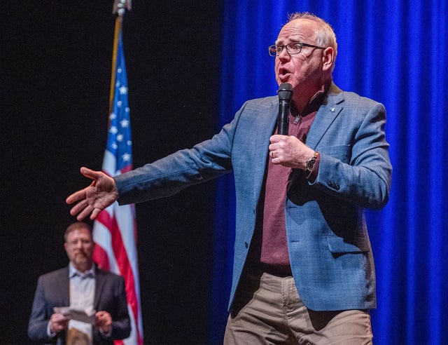 Minnesota Gov. Tim Walz addressed the concerns of audience members about the actions of President Donald Trump and Elon Musk at the Pablo Center in Eau Claire, Wisconsin, on Tuesday, March 18, 2025.