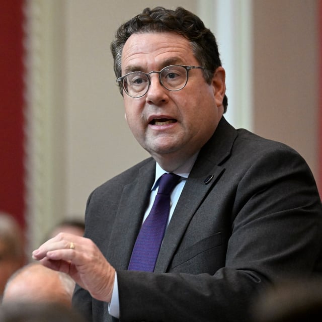 Quebec Education Minister Bernard Drainville responds to the Opposition during question period at the legislature in Quebec City, Oct. 22, 2024. THE CANADIAN PRESS/Jacques Boissinot