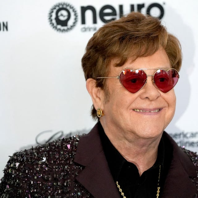 FILE PHOTO: Elton John poses during arrivals at his party to celebrate the Oscars at the 95th Academy Awards in Los Angeles, California, U.S., March 12, 2023. REUTERS/Lauren Justice