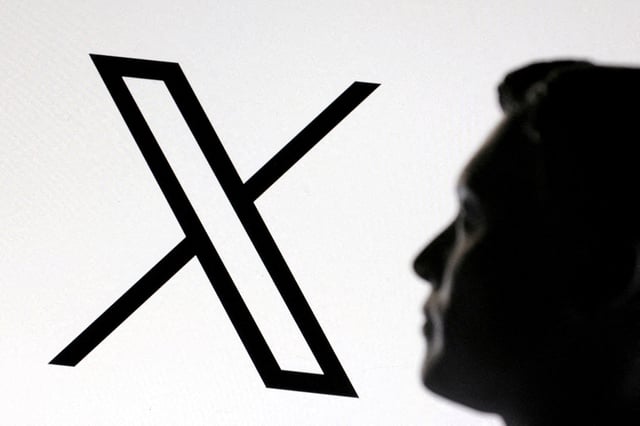 A 3D-printed miniature model of Elon Musk and the X logo are seen in this illustration taken January 23, 2025. REUTERS/Dado Ruvic/File Photo