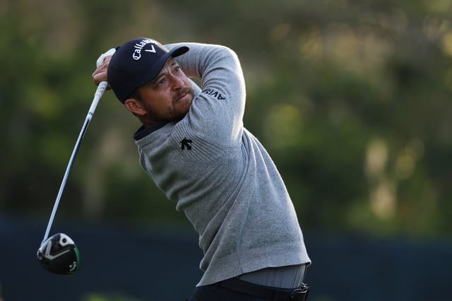 PONTE VEDRA BEACH, FLORIDA - MARCH 14: Xander Schauffele of the United States plays his shot from the 11th tee during the second round of THE PLAYERS Championship on the Stadium Course at TPC Sawgrass on March 14, 2025 in Ponte Vedra Beach, Florida. (Photo by Richard Heathcote/Getty Images)