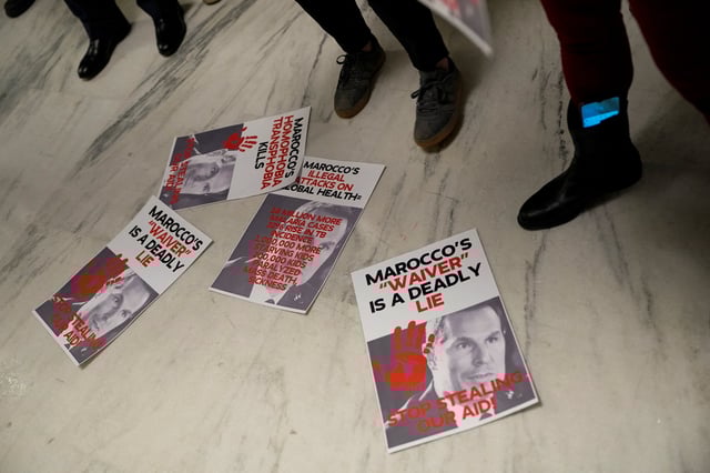 People protest as Pete Marocco, deputy administrator-designate at the U.S. Agency for International Development (USAID), attends a meeting with members of Congress to discuss foreign assistance, on Capitol Hill in Washington, D.C., U.S. March 5, 2025.