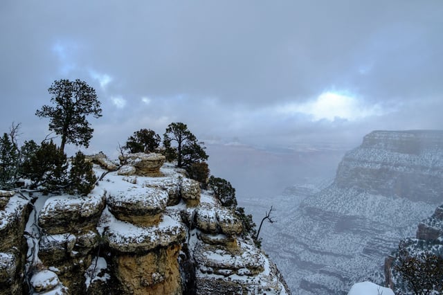FILE: Snow on the cliffs of the Grand Canyon on Jan. 8, 2024, following a snowstorm.