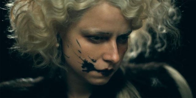 A close up of Jessie Buckley as The Bride 