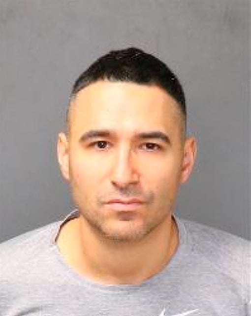Solomon Pena poses for a jail booking photograph after his arrest by the Albuquerque Police Department in Albuquerque, New Mexico, U.S. January 17, 2023.  Metropolitan Detention Center/Handout via REUTERS/File Photo