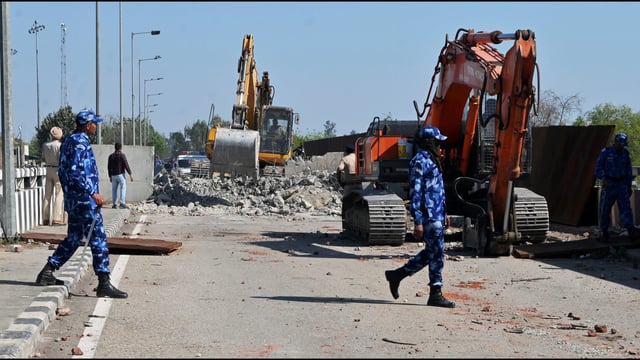 Barricades being removed after the eviction of agitating farmers from the Shambhu border, in Patiala district. (PTI)