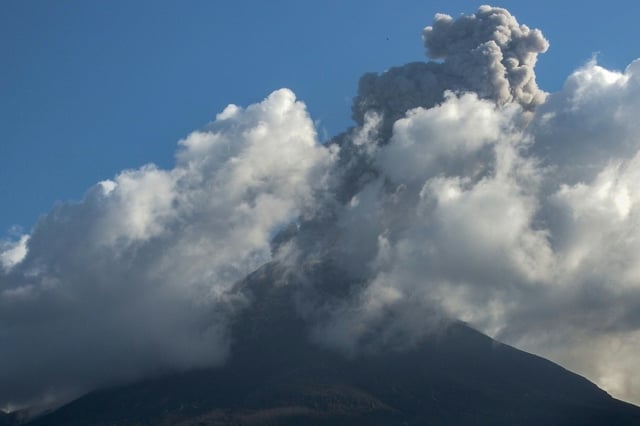 Mount Lewotobi Laki-Laki spews volcanic ash during an eruption as seen from East Flores, Indonesia on March 1, 2025
