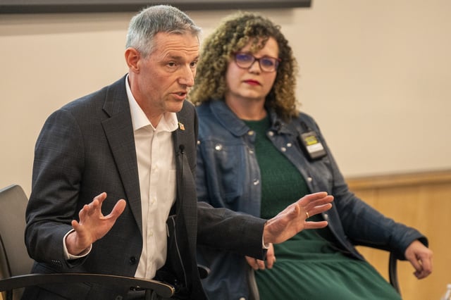 Reps. Mike Kennedy and Celeste Maloy, R-Utah, speak during a GOP town hall meeting Thursday, March 20, 2025, in Salt Lake City. (AP Photo/Rick Egan)