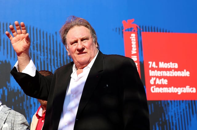 Gerard Depardieu waves as he arrives during a red carpet event for the movie "Novecento- Atto Primo" at the 74th Venice Film Festival in Venice, Italy, Italy September 5, 2017.   REUTERS/Alessandro Bianchi/File Photo