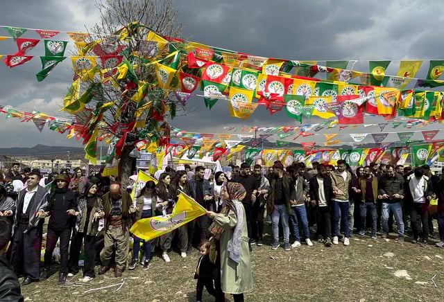 People dance during the celebration of the spring festival of Newroz, in Sirnak, southeastern Turkey, March 19, 2025. REUTERS/Daren Butler
