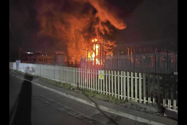 This photo provided by London Fire Brigade, shows a fire at the North Hyde electrical substation, which caught fire Thursday night and lead to a closure of Heathrow Airport in London, Friday.