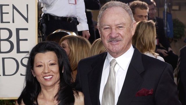 FILE - Actor Gene Hackman arrives with his wife, Betsy Arakawa, for the 60th Annual Golden Globe Awards in Beverly Hills, Calif., Sunday, Jan. 19, 2003. (AP Photo/Mark J. Terrill, File)