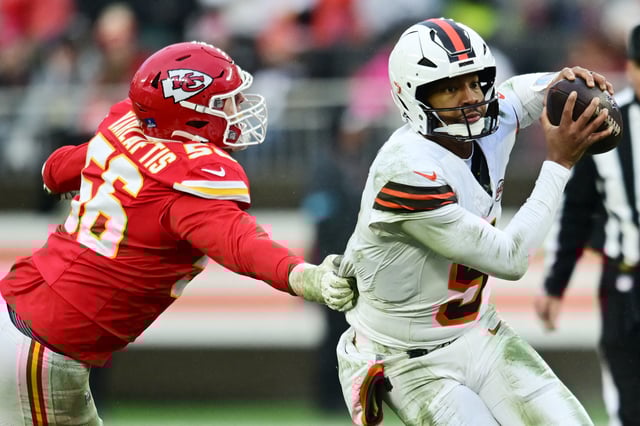 Dec 15, 2024; Cleveland, Ohio, USA; Kansas City Chiefs defensive end George Karlaftis (56) grabs the jersey of Cleveland Browns quarterback Jameis Winston (5)during the second half at Huntington Bank Field. Mandatory Credit: Ken Blaze-Imagn Images/ File Photo