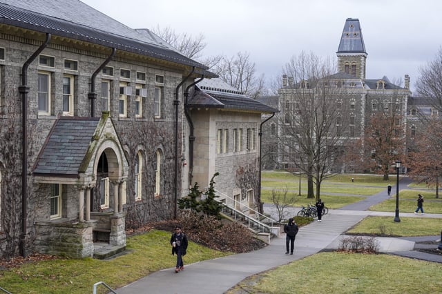 People walk on the campus of Cornell University in Ithaca, N.Y., on Feb. 2, 2024.