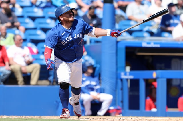 Mar 21, 2025; Dunedin, Florida, USA; Toronto Blue Jays catcher Alejandro Kirk (30) hits a home run against the Philadelphia Phillies in the eighth inning during spring training at TD Ballpark. Mandatory Credit: Nathan Ray Seebeck-Imagn Images/File Photo
