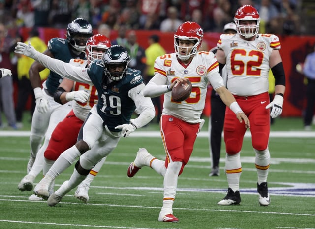 Football - NFL - Super Bowl LIX - Philadelphia Eagles v Kansas City Chiefs - Caesars Superdome, New Orleans, Louisiana, United States - February 9, 2025 Kansas City Chiefs' Patrick Mahomes in action with Philadelphia Eagles' Josh Sweat REUTERS/Mike Segar/File Photo