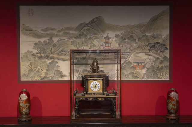 An elaborate antique clock is displayed on the sprawling compound of the Forbidden City also known as the Palace Museum in Beijing, Friday, Feb. 21, 2025. (AP Photo/Ng Han Guan)