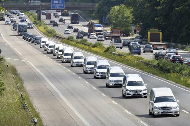 FILE - A convoy of hearses drive along the highway in Duisburg, Germany, June 10, 2015, taking home 16 school children who died in the Germanwings plane crash over the French Alps. (AP Photo/Martin Meissner, file)