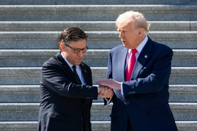 Speaker Mike Johnson, R-La., left, speaks with President Donald Trump on the House steps on March 12.