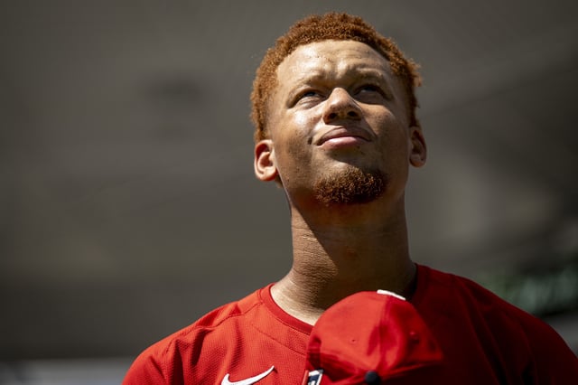 FORT MYERS, FLORIDA - MARCH 15: Kristian Campbell #28 of the Boston Red Sox looks on during the National Anthem before a game against the Atlanta Braves at JetBlue Park at Fenway South in Fort Myers, Florida on March 15, 2025.