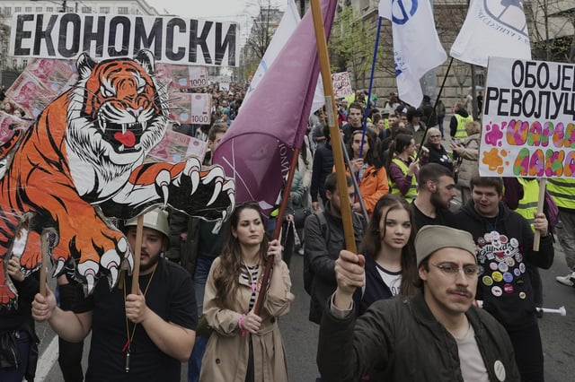 People take part protest rally in Belgrade, Serbia, Monday, March 24, 2025, against a real estate development project that will be financed by the firm of Donald Trump's son-in-law, Jared Kushner, at the site of the former Yugoslav army headquarters destroyed in a U.S.-led NATO bombing campaign in 1999. (AP Photo/Darko Vojinovic)