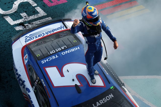 Kyle Larson, driver of the #5 HendrickCars.com Chevrolet, celebrates after winning the NASCAR Cup Series Straight Talk Wireless 400 at Homestead-Miami Speedway on March 23, 2025 in Homestead, Florida.
