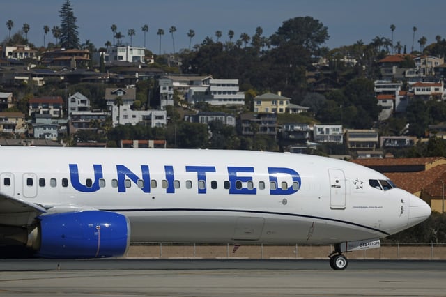 A United Airlines Boeing 737 taxis at San Diego International Airport on March 4, 2025 in San Diego, California. 