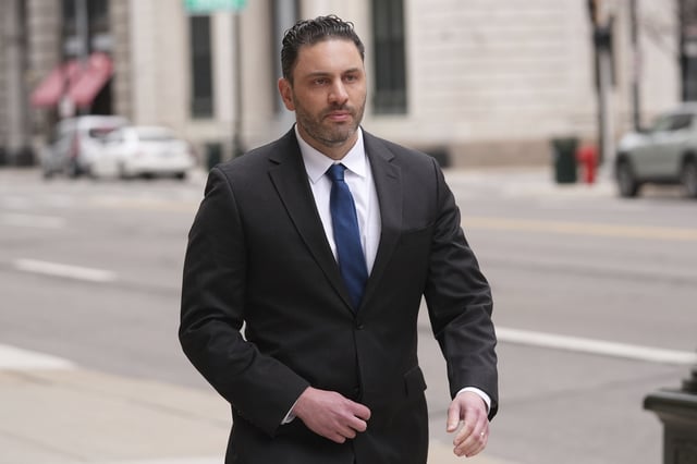 Former NFL and University of Michigan assistant football coach Matt Weiss leaves federal court in Detroit, Monday, March 24, 2025. (AP Photo/Paul Sancya)