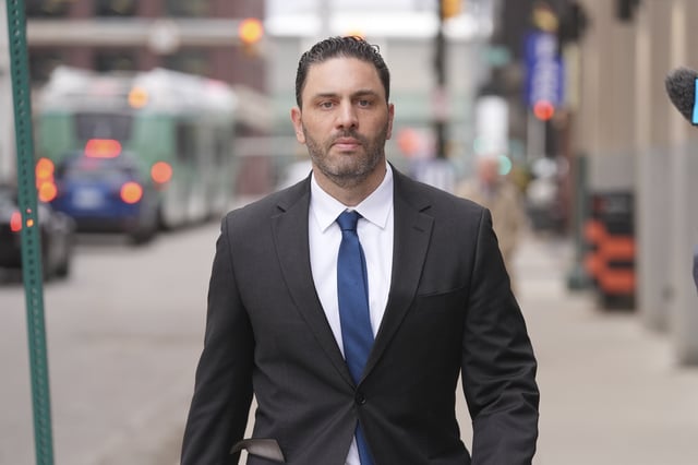 Former NFL and University of Michigan assistant football coach Matt Weiss leaves federal court in Detroit, Monday, March 24, 2025. (AP Photo/Paul Sancya)