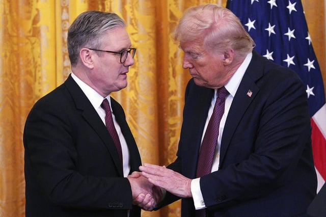 Starmer and Trump shake hands at a joint press conference in the East Room at the White House in February (Carl Court/Pool Photo via AP)