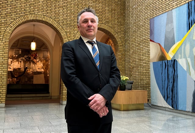 Norwegian Defence Minister Tore O. Sandvik poses for a picture at the Norwegian Parliament in Oslo, Norway, March 19, 2025. REUTERS/Gwladys Fouche