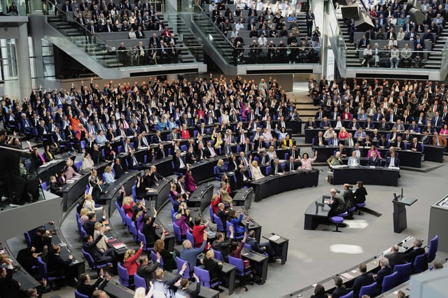 Lawmakers attend the constituent session of the newly elected German Parliament Bundestag in Berlin, Germany, Tuesday, March 25, 2025. (AP Photo/Markus Schreiber)
