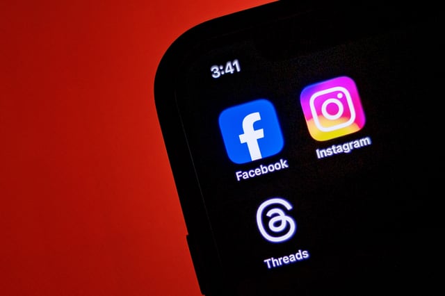 In this photo illustration, the Facebook, Instagram, and Threads applications are seen on a phone on January 08, 2025 in Santa Rosa, Philippines.