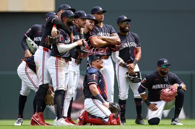 May 30, 2024; Minneapolis, Minnesota, USA; Members of the Minnesota Twins celebrate their teams win against the Kansas City Royals after the game at Target Field. Mandatory Credit: Matt Krohn-USA TODAY Sports/File Photo