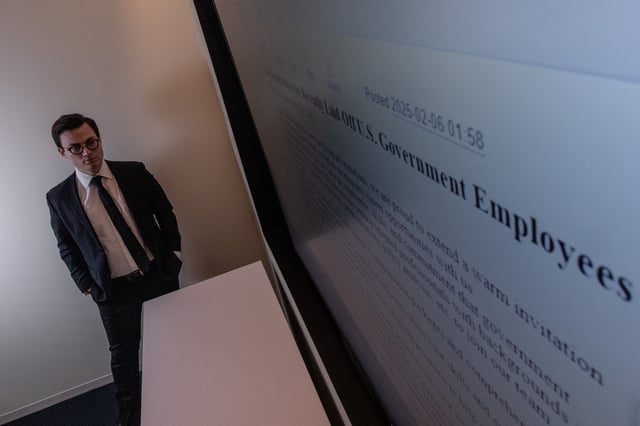 Max Lesser, a senior analyst on emerging threats at the Foundation for Defense of Democracies poses for a portrait at an office in Washington, D.C., U.S., March 24, 2025. REUTERS/Carlos Barria