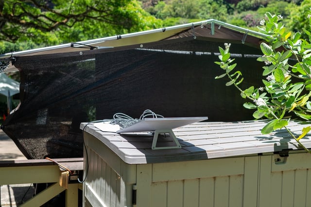 A Starlink terminal provides broadband satellite internet access in a remote location in Oahu, Hawaii, July 22, 2024. (Photo by Smith Collection/Gado/Getty Images)