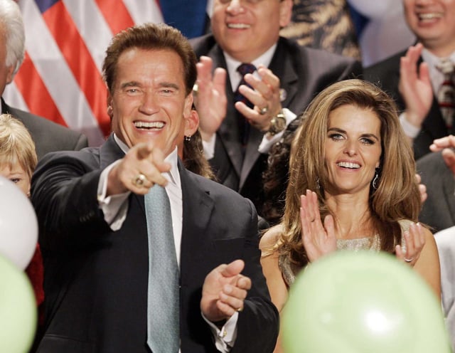 Gov. Arnold Schwarzenegger celebrates with his wife Maria Shriver after giving his acceptance speech, in Beverly Hills, in 2006. In her new poetry collection, Shriver opens up about the emotional turmoil that followed the breakdown of her 25-year marriage to the actor.