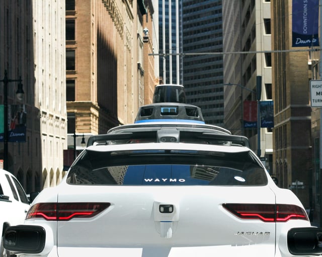 waymo driverless car in city