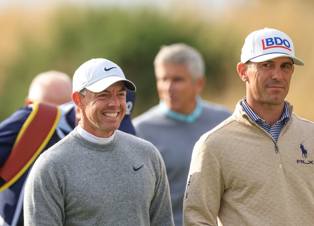 ST ANDREWS, SCOTLAND - OCTOBER 04: Rory McIlroy of Northern Ireland and Billy Horschel of The United States walk off the tee on the first hole on day two of the Alfred Dunhill Links Championship 2024 at Kingsbarns Golf Club on October 04, 2024 in Kingsbarns, Scotland.