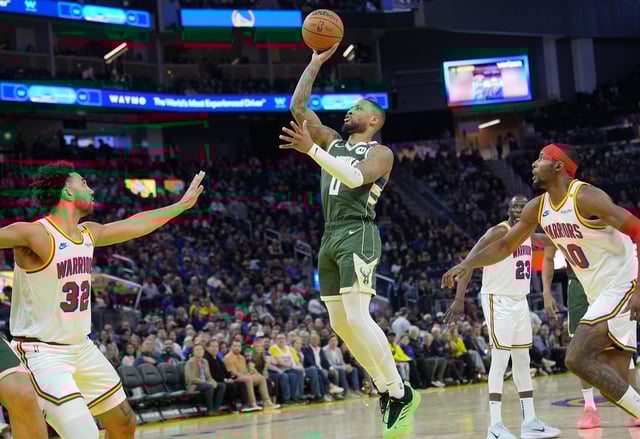 Damian Lillard #0 of the Milwaukee Bucks shoots against the Golden State Warriors during the first half of an NBA basketball game at Chase Center on March 18, 2025 in San Francisco, California.