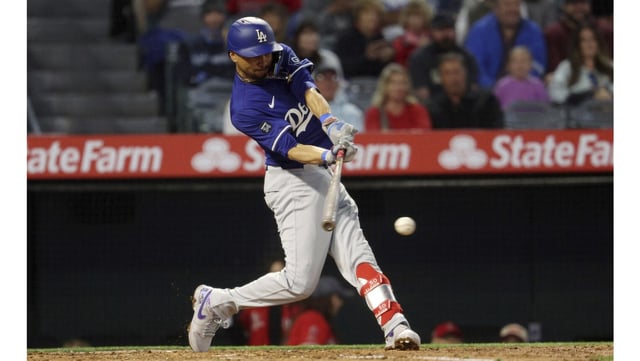 Dodgers star Mookie Betts hits a ground out during the sixth inning of their Freeway Series exhibition finale against the Angels on Tuesday night at Angel Stadium. (AP Photo/Kevork Djansezian)
