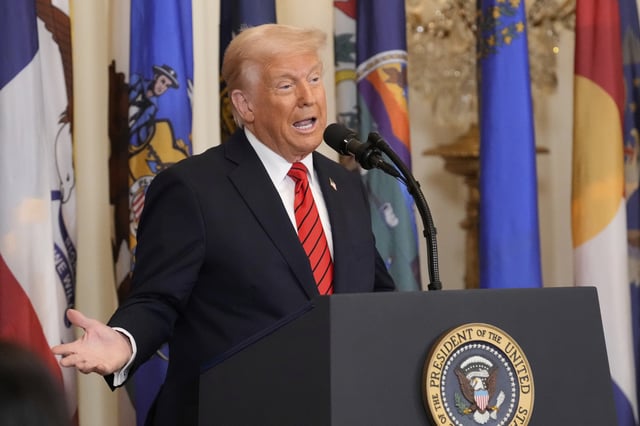 President Donald Trump waves as he departs a reception celebrating Greek Independence Day in the East Room of the White House, Monday, March 24, 2025, in Washington.