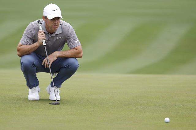 Mar 16, 2025; Ponte Vedra Beach, Florida, USA; Rory McIlroy eyes his putt on the second green during the final round of The Players Championship golf tournament at TPC Sawgrass. Mandatory Credit: Jeff Swinger-Imagn Images/File Photo
