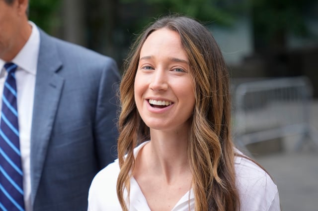 FILE - Charlie Javice leaves Federal Court, Wednesday, Aug. 23, 2023, in New York. (AP Photo/John Minchillo, File)