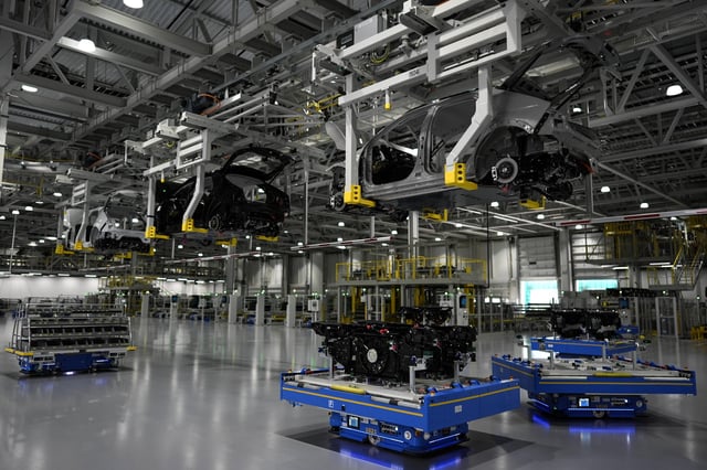 Robotic apparatus moves on the floor during a media tour at the Hyundai Motor Group Metaplant America, Wednesday, March 26, 2025, in Ellabell, Ga. (AP Photo/Mike Stewart)