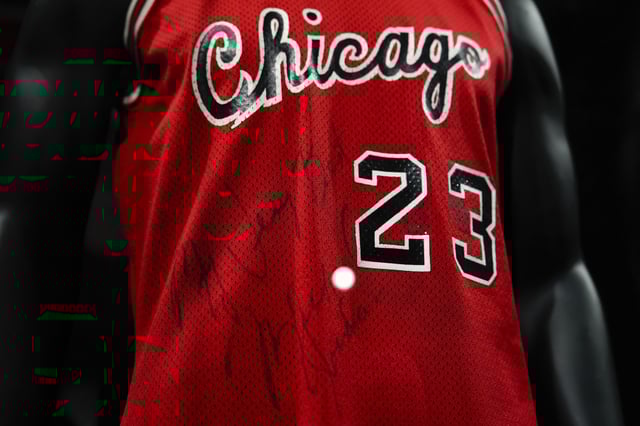 Michael Jordan's first game-worn Chicago Bulls jersey is displayed at Sotheby's, Friday, March 21, 2025, in New York, where they are set to be auctioned. (AP Photo/Julia Demaree Nikhinson)