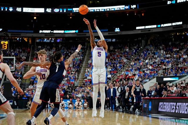 Florida Gators guard Will Richard (5) shoots against the Connecticut Huskies in the second round of the NCAA Tournament.