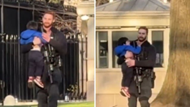 A Secret Service agent carrying a kid who squeezed through the White House fence. 